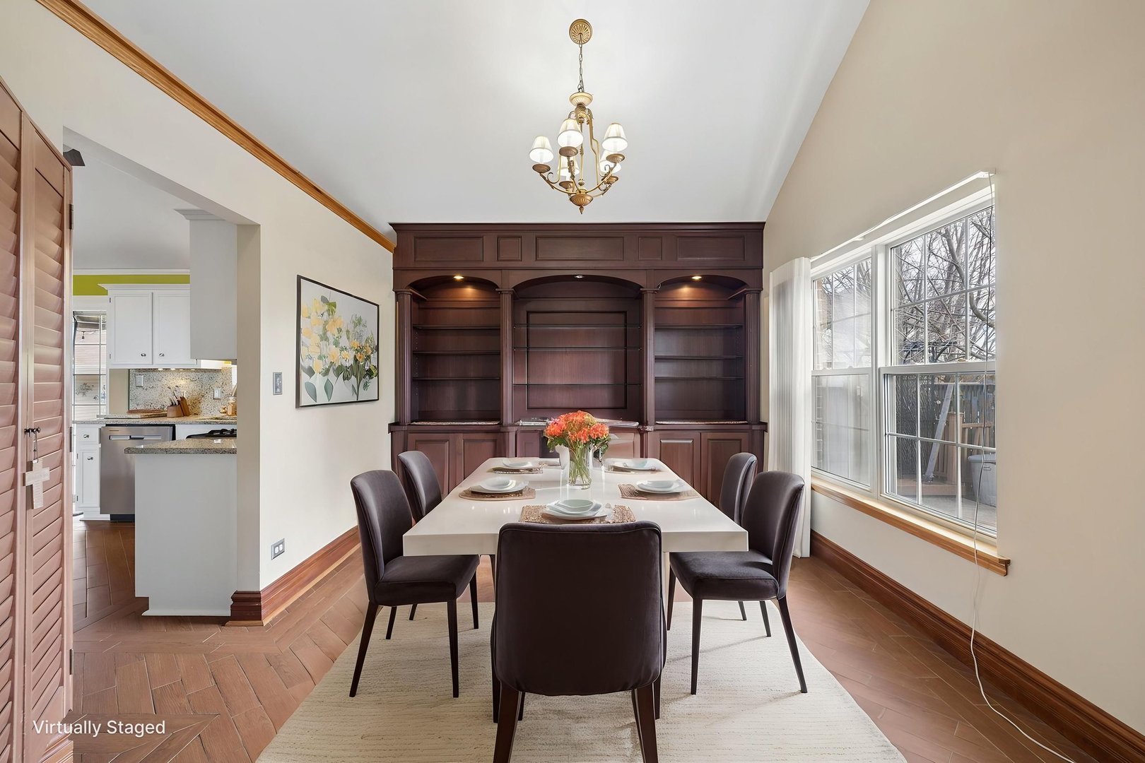 1035 Yamma Ridge New Lenox, IL 60451 - Photo 12 of 51 a dining room with furniture a chandelier and wooden floor