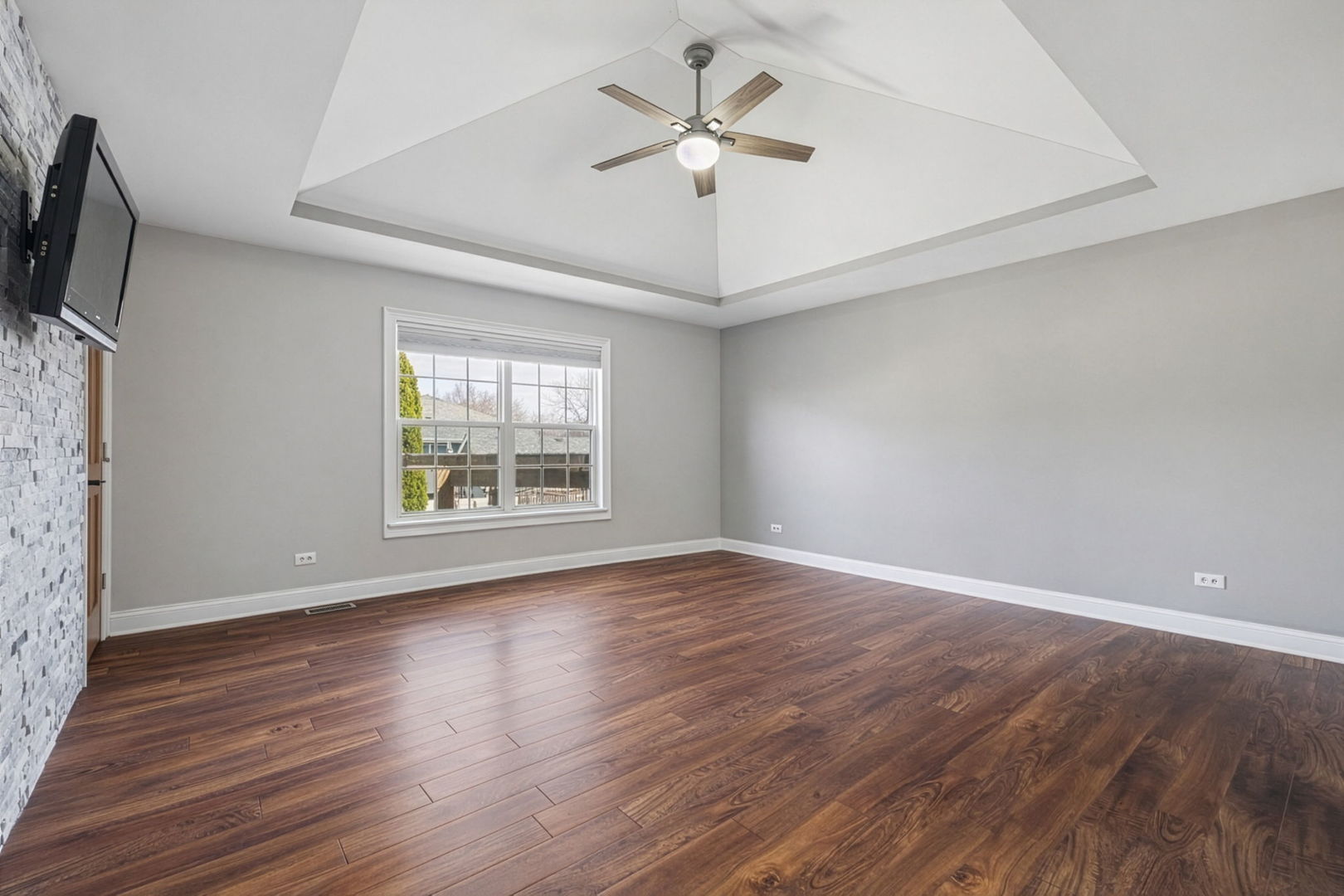 1035 Yamma Ridge New Lenox, IL 60451 - Photo 13 of 51 an empty room with wooden floor fan and windows