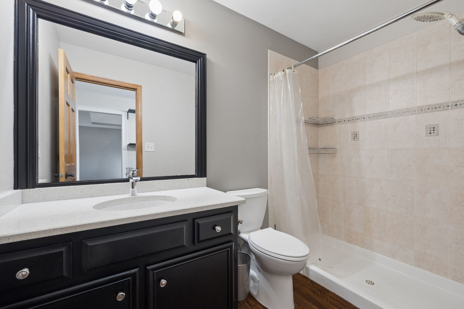 1035 Yamma Ridge New Lenox, IL 60451 - Photo 17 of 51 a bathroom with a sink a toilet a mirror and shower