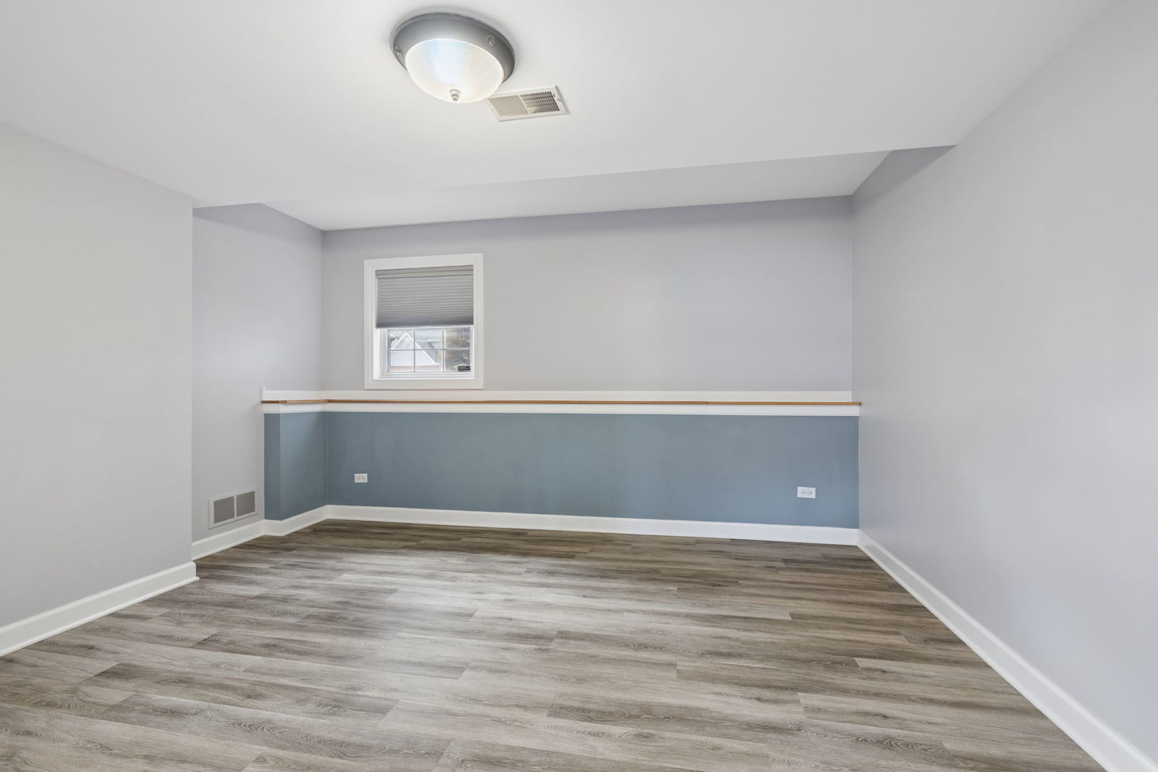 1035 Yamma Ridge New Lenox, IL 60451 - Photo 22 of 51 a view of an empty room with wooden floor and a window