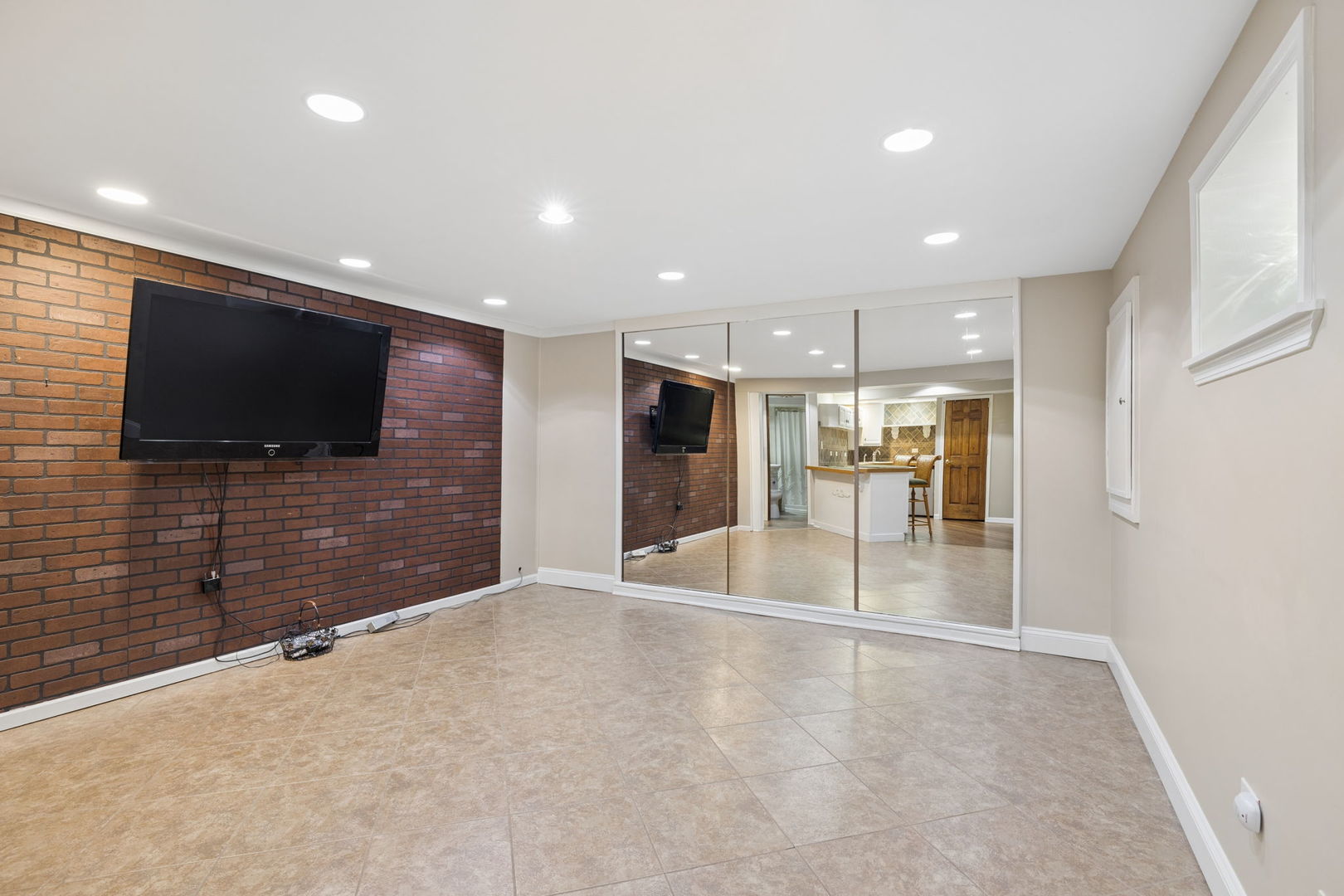 1035 Yamma Ridge New Lenox, IL 60451 - Photo 31 of 51 a view of a livingroom with a flat screen tv