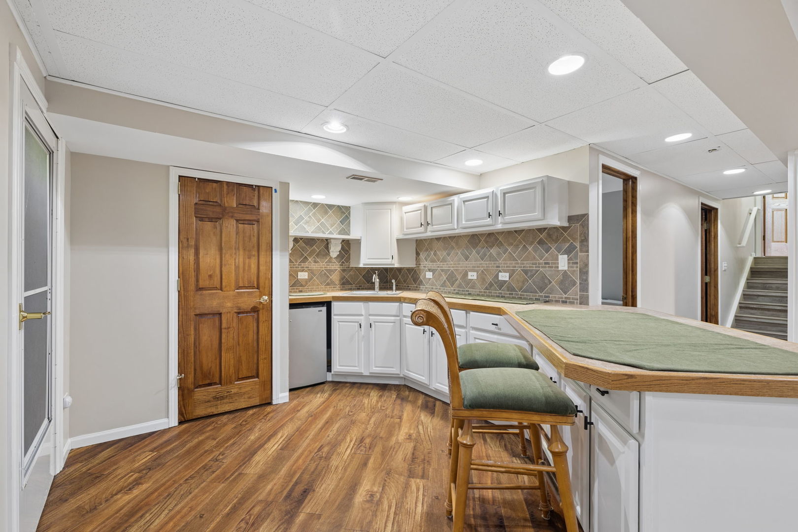 1035 Yamma Ridge New Lenox, IL 60451 - Photo 32 of 51 a kitchen with a refrigerator a sink and wooden cabinets