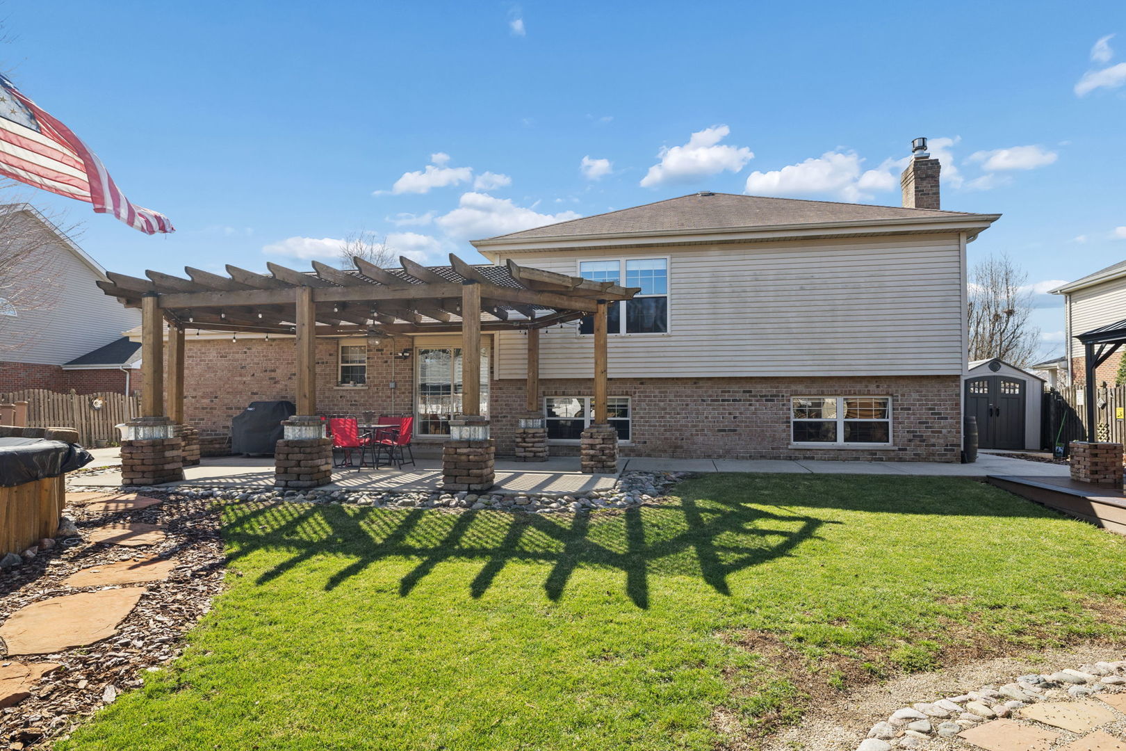 1035 Yamma Ridge New Lenox, IL 60451 - Photo 40 of 51 a view of a house with backyard porch and sitting area