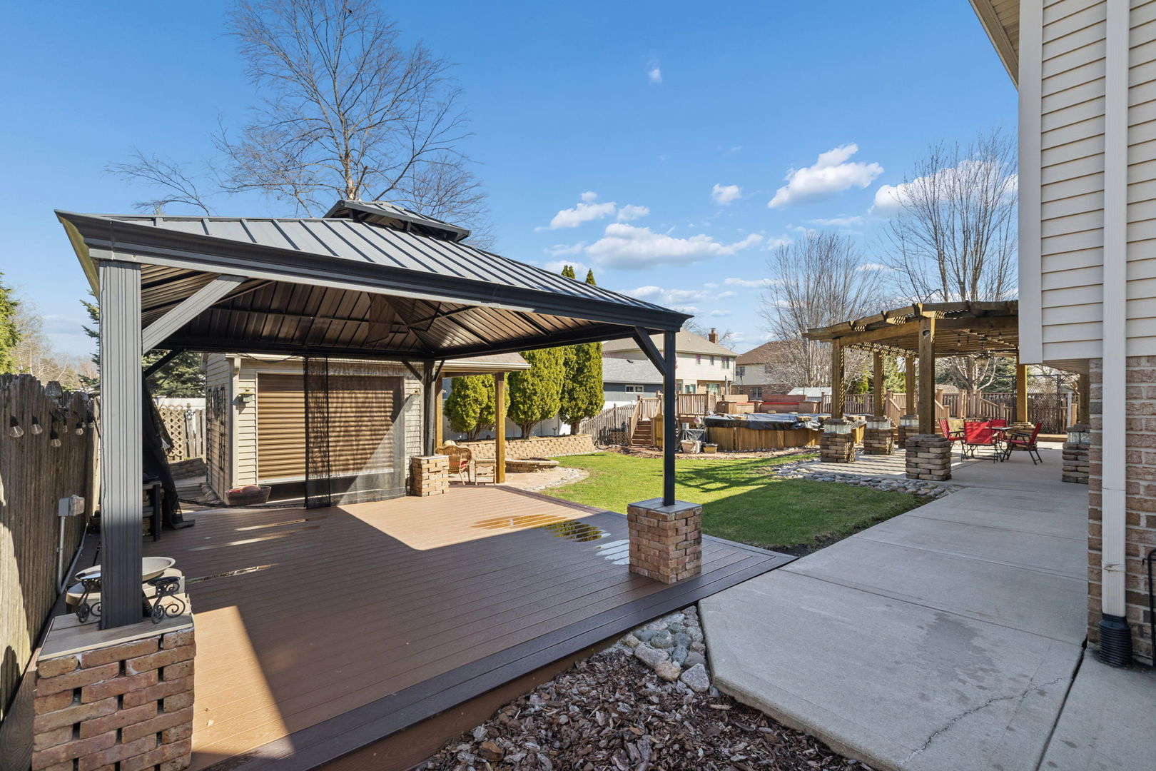 1035 Yamma Ridge New Lenox, IL 60451 - Photo 41 of 51 a view of a patio with a table chairs and a small yard