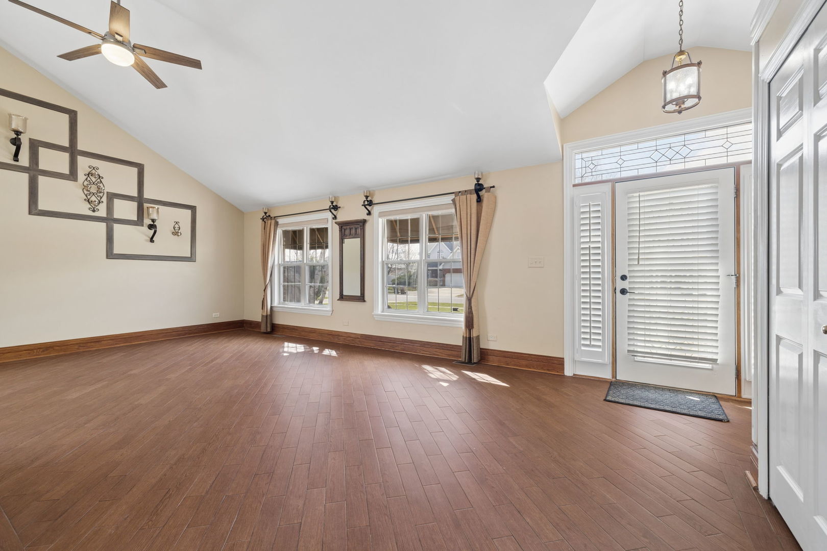 1035 Yamma Ridge New Lenox, IL 60451 - Photo 5 of 51 an empty room with wooden floor and windows