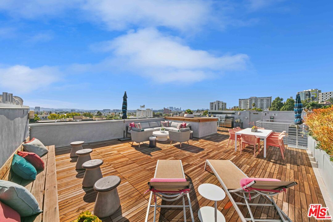1232 North Kings Road, Unit 105 West Hollywood, CA 90069 - Photo 20 of 22 a picture of a lake view