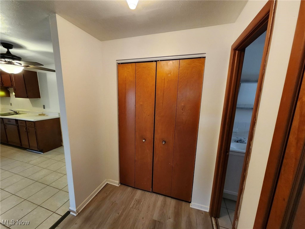 5378 Lee Road, Unit 304 Maple Heights, OH 44137 - Photo 17 of 21 Hallway to bedroom and full bathroom with closet