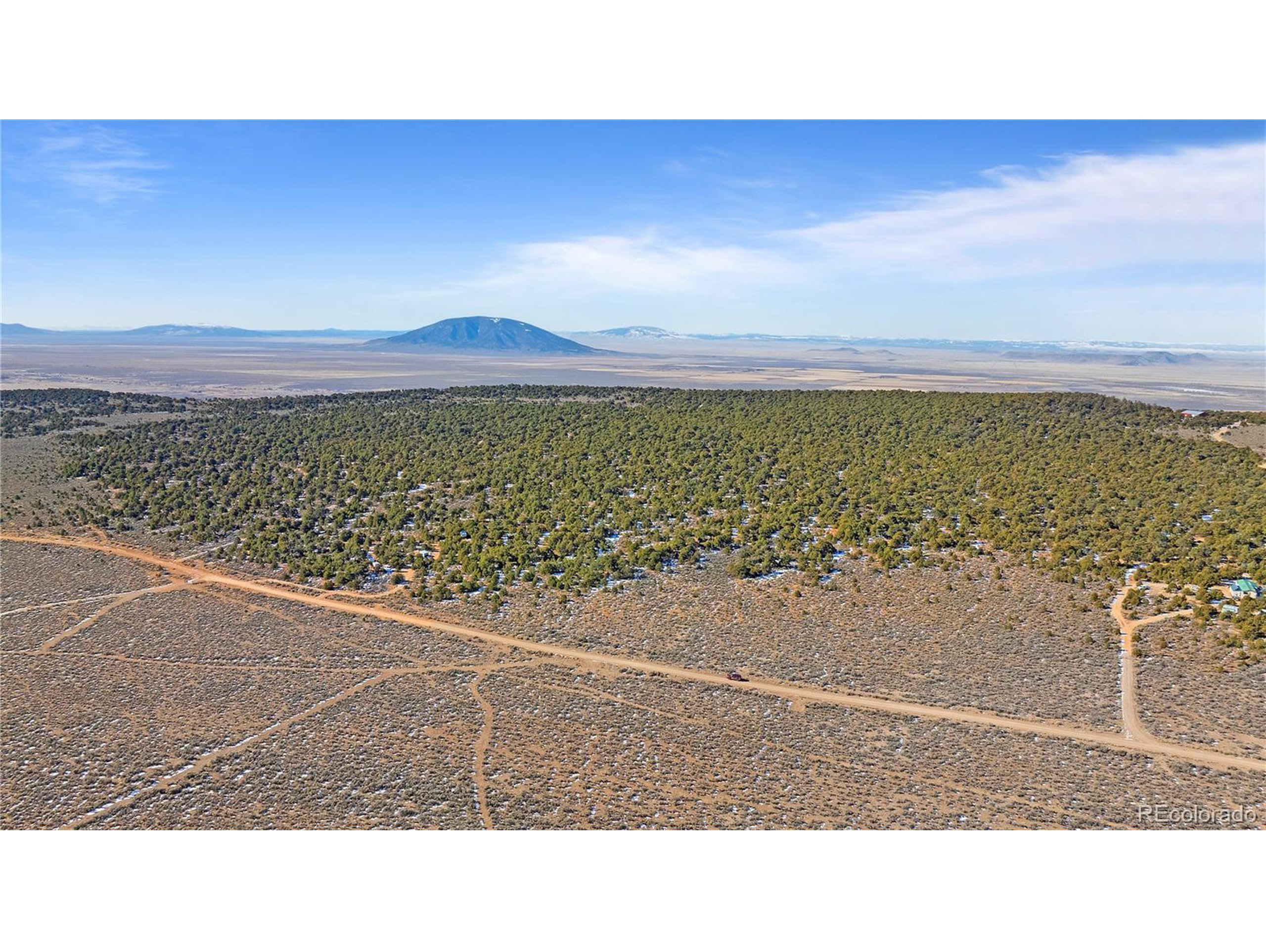 90 Elk Park Road San Luis, CO 81152 - Photo 2 of 34 a black and white photo of a lake