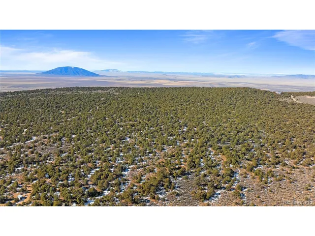 a picture of city and a lake