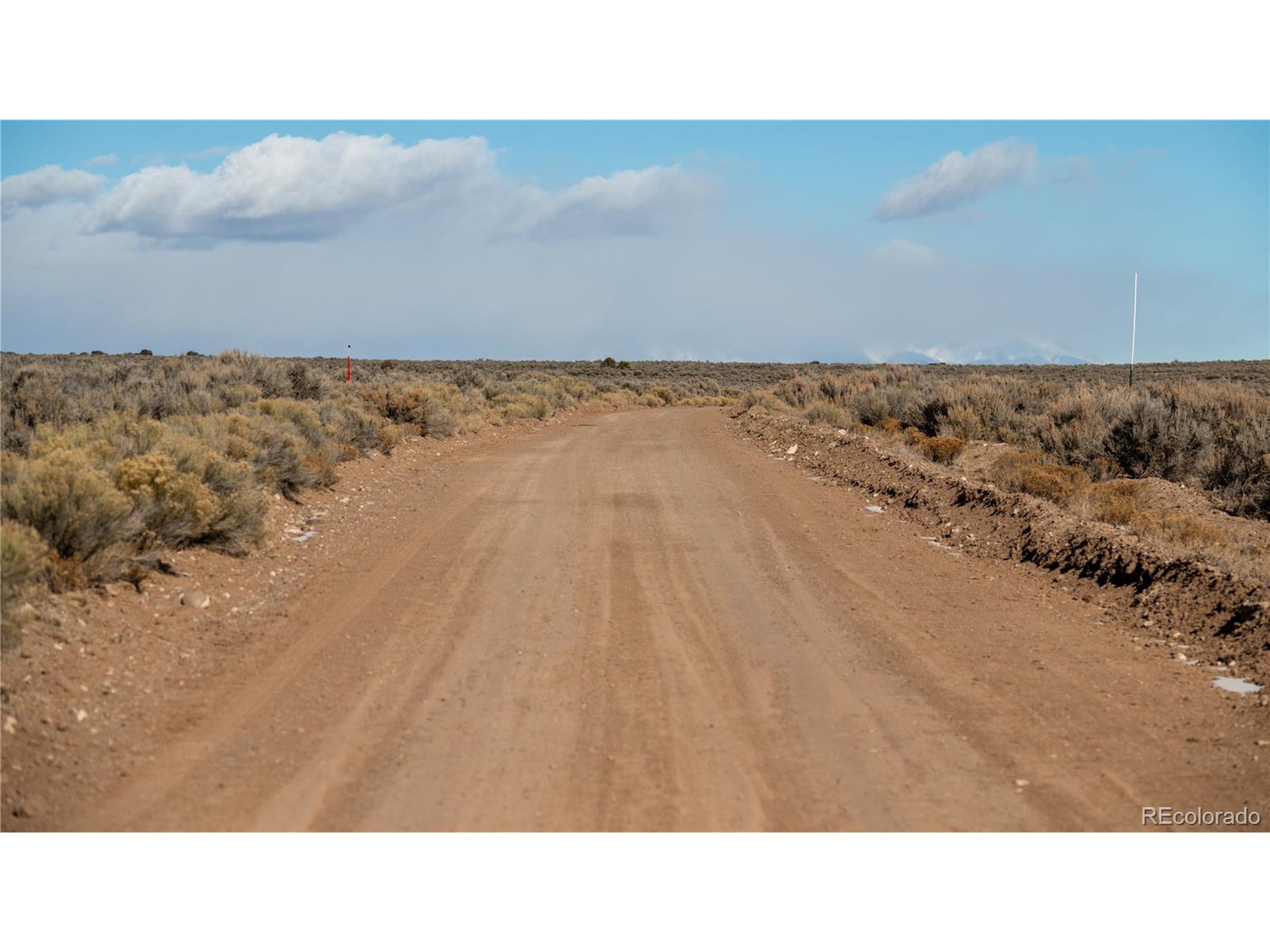 90 Elk Park Road San Luis, CO 81152 - Photo 7 of 34 a open area with a bench in it