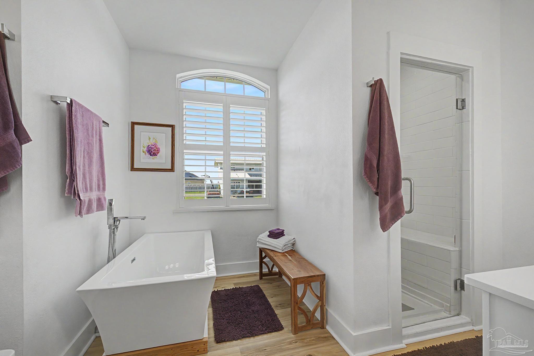2005 Riviera Lane South Navarre, FL 32566 - Photo 24 of 70 a bathroom with a tub and a window