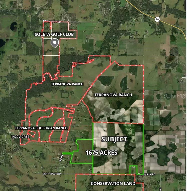 Clay Gully Road Myakka City, FL 34251 - Photo 2 of 5 an aerial view of a street sign