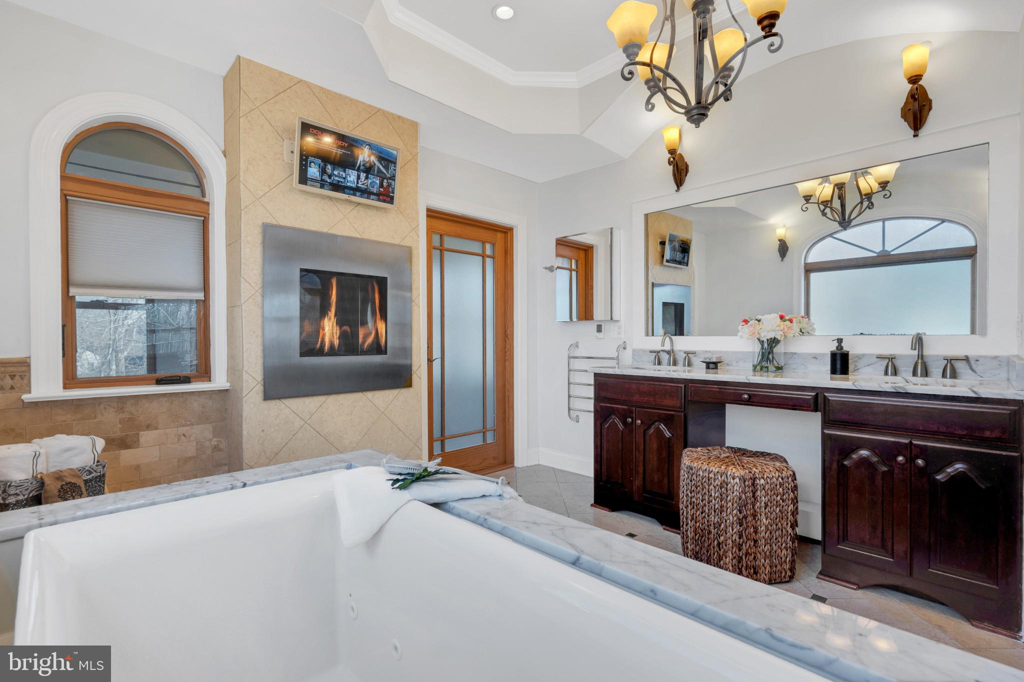 5508 North Carlin Springs Road Arlington, VA 22203 - Photo 24 of 56 master bath w/ fireplace & TV