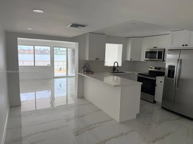 a close up of a toilet and a sink