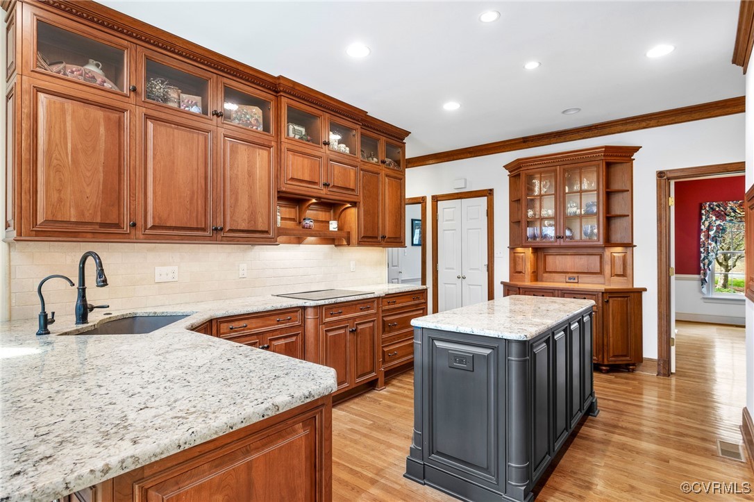 5219 Clipper Cove Road Midlothian, VA 23112 - Photo 14 of 49 a kitchen with stainless steel appliances granite countertop wooden cabinets a sink and dishwasher