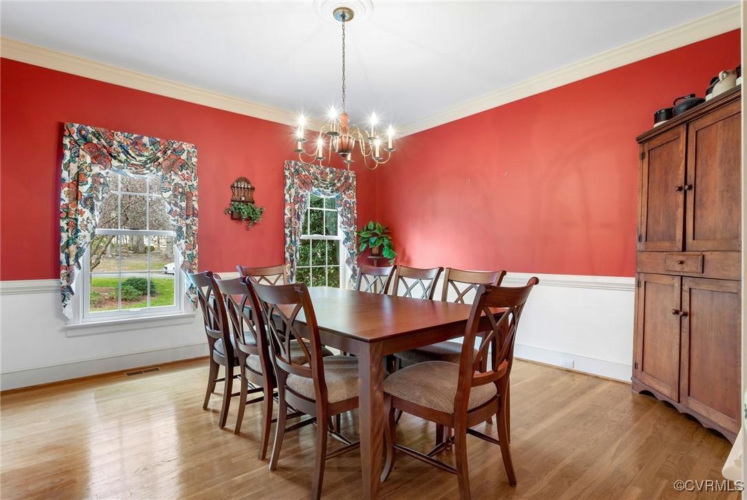 5219 Clipper Cove Road Midlothian, VA 23112 - Photo 20 of 49 a view of a dining room with furniture window and wooden floor