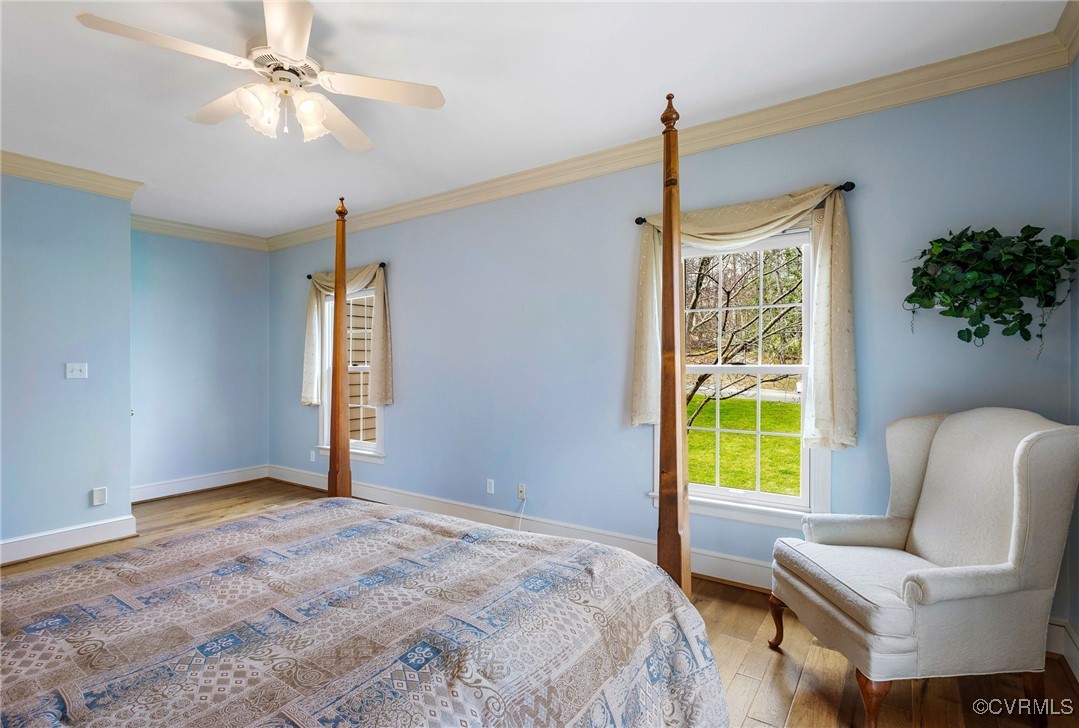 5219 Clipper Cove Road Midlothian, VA 23112 - Photo 25 of 49 a bedroom with furniture and a window