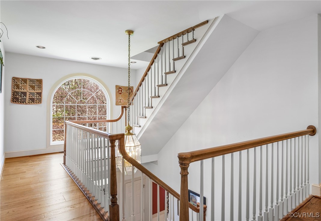 5219 Clipper Cove Road Midlothian, VA 23112 - Photo 30 of 49 a view of staircase with wooden floor and a large window