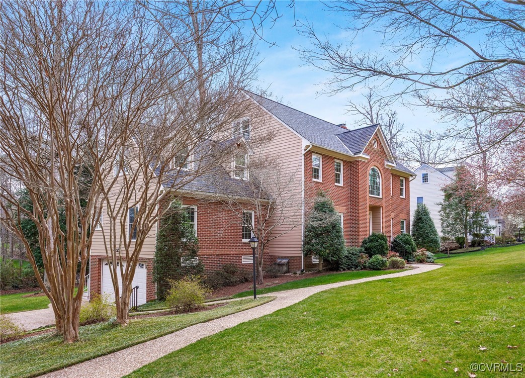 5219 Clipper Cove Road Midlothian, VA 23112 - Photo 3 of 49 a brick building with a big yard plants and large trees