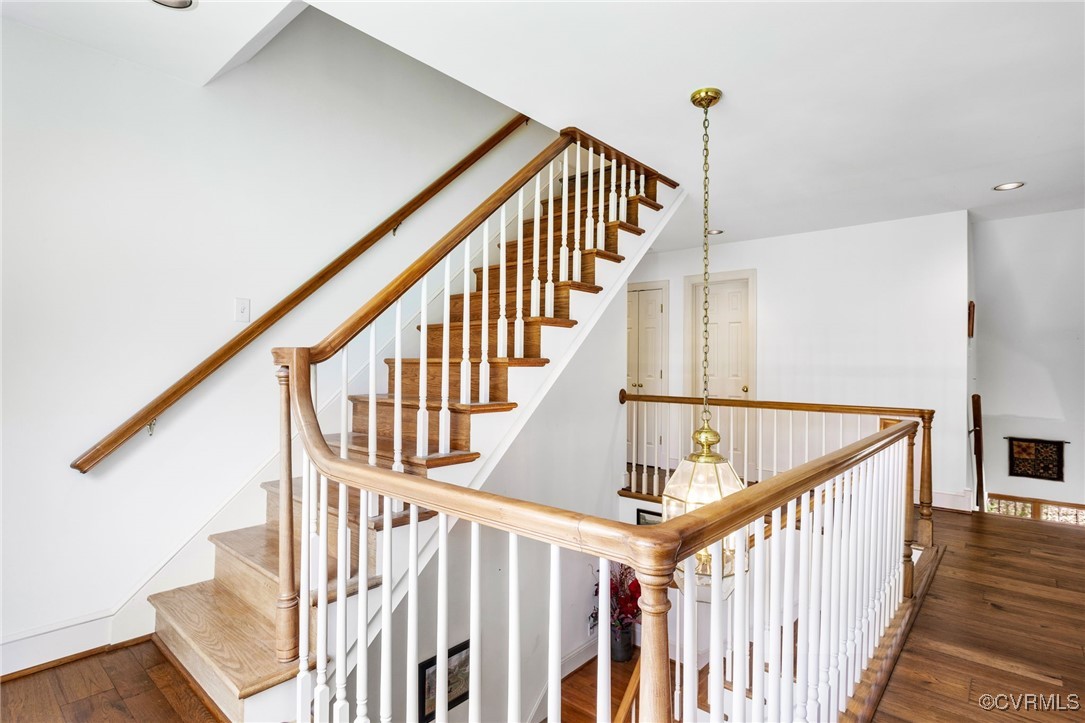5219 Clipper Cove Road Midlothian, VA 23112 - Photo 31 of 49 a view of staircase with wooden floor and white walls