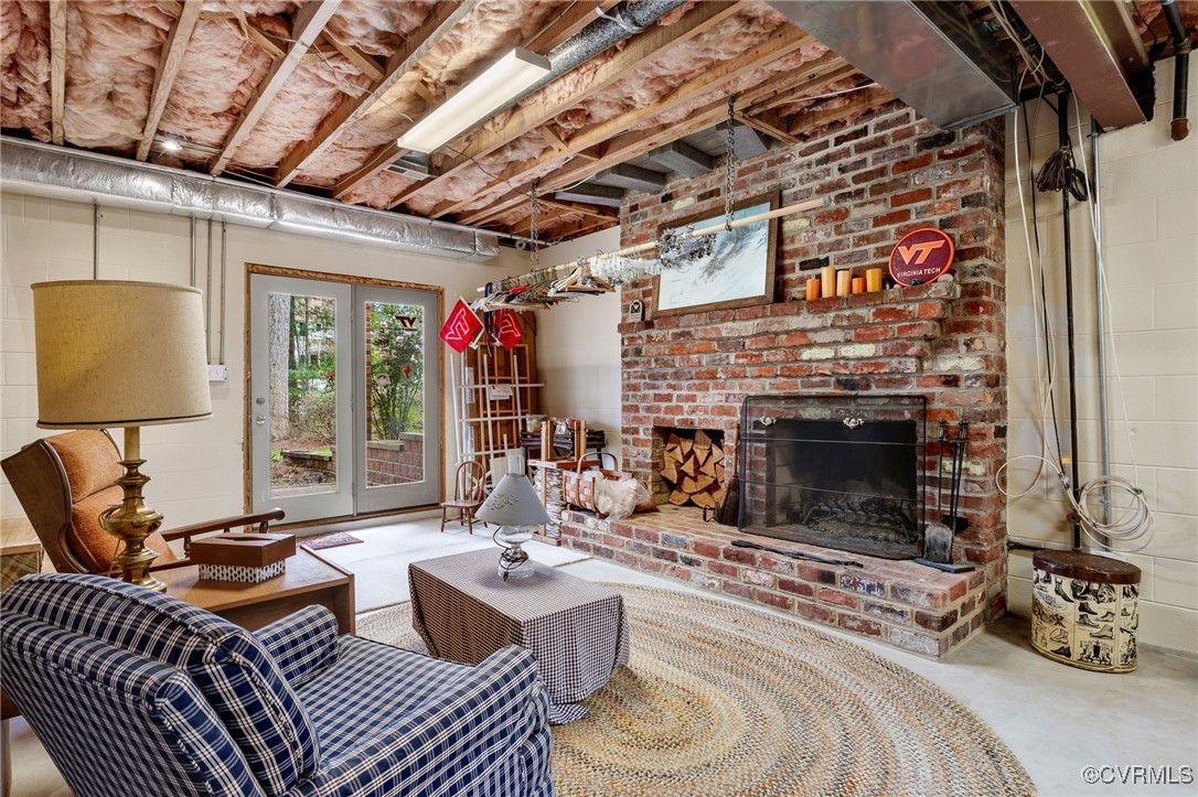 5219 Clipper Cove Road Midlothian, VA 23112 - Photo 40 of 49 a living room with furniture and a fireplace