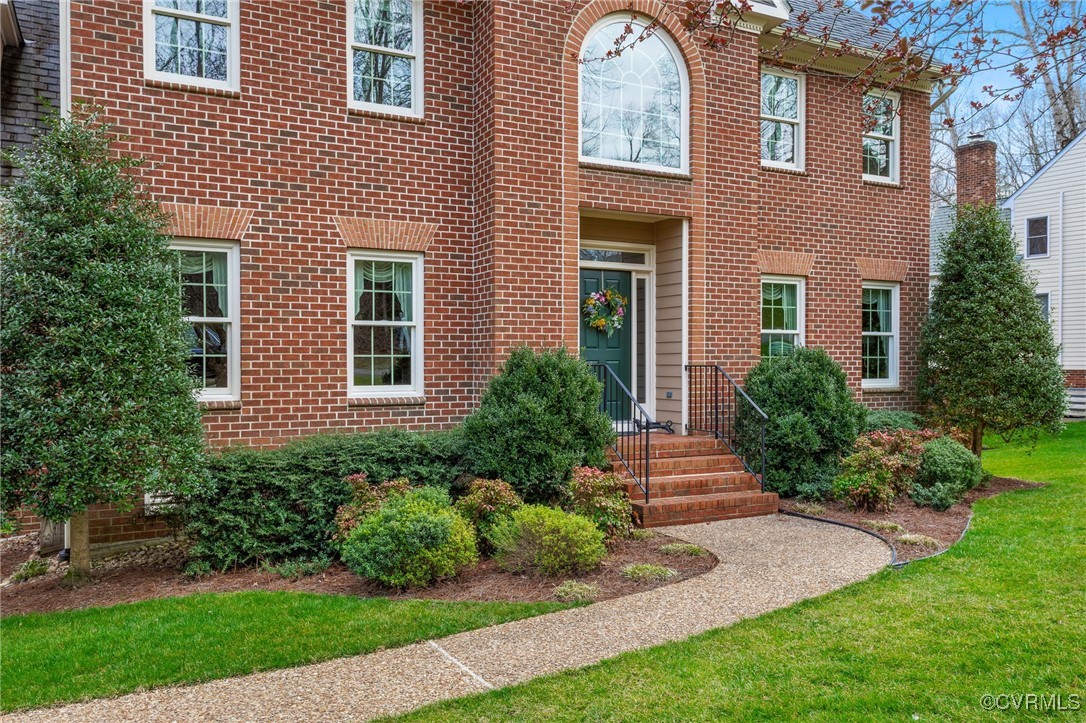 5219 Clipper Cove Road Midlothian, VA 23112 - Photo 4 of 49 a front view of a house with a yard