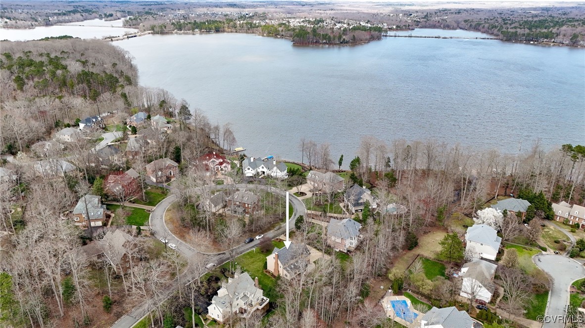 5219 Clipper Cove Road Midlothian, VA 23112 - Photo 49 of 49 a view of a lake with a mountain in the background