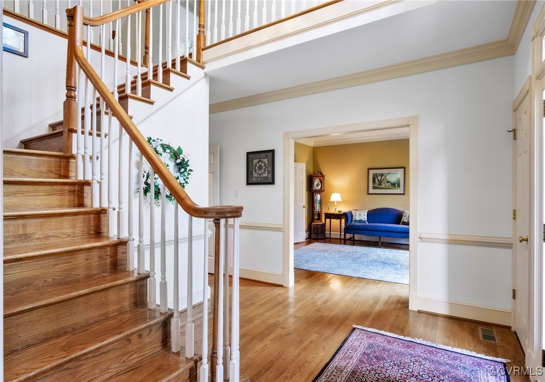 5219 Clipper Cove Road Midlothian, VA 23112 - Photo 6 of 49 a view of entryway and hall with wooden floor