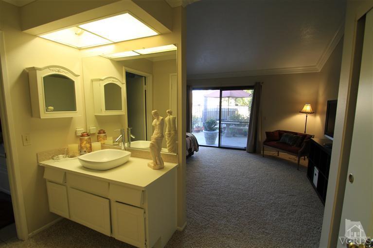 3948 Southhampton Road Moorpark, CA 93021 - Photo 14 of 30 a en suite bathroom with sink and mirror