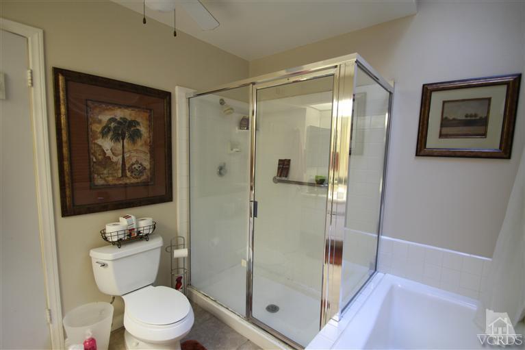 3948 Southhampton Road Moorpark, CA 93021 - Photo 16 of 30 a bathroom with a toilet a sink and shower