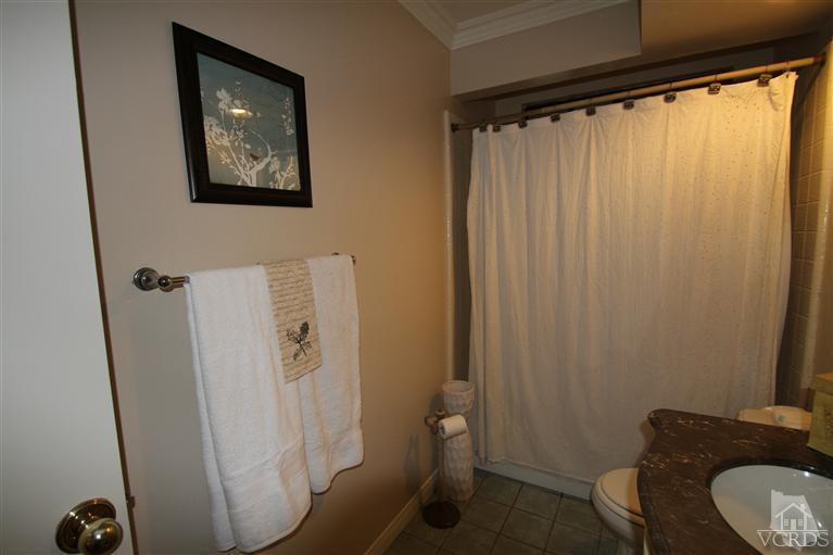 3948 Southhampton Road Moorpark, CA 93021 - Photo 24 of 30 a bathroom with a toilet and a shower