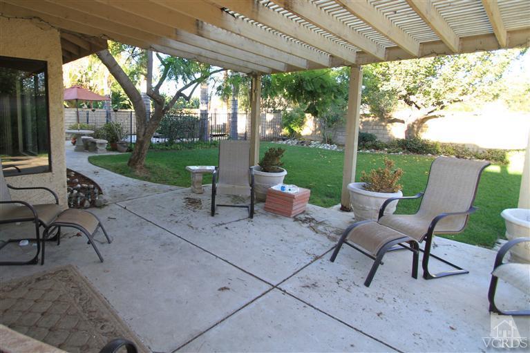 3948 Southhampton Road Moorpark, CA 93021 - Photo 28 of 30 a view of a patio with chairs and table in patio
