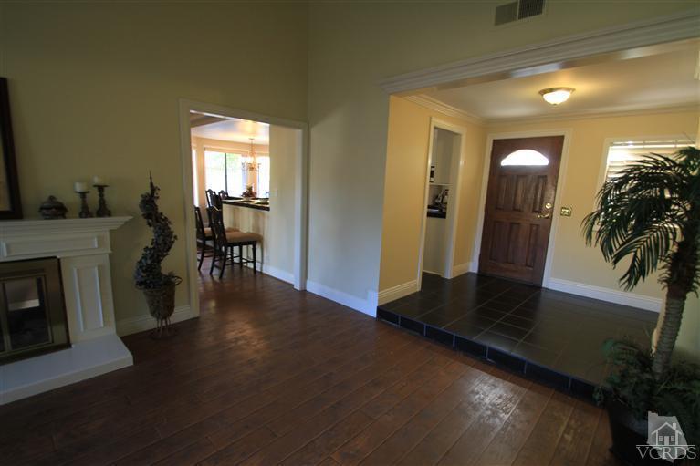 3948 Southhampton Road Moorpark, CA 93021 - Photo 7 of 30 a view of a livingroom with furniture and hardwood floor