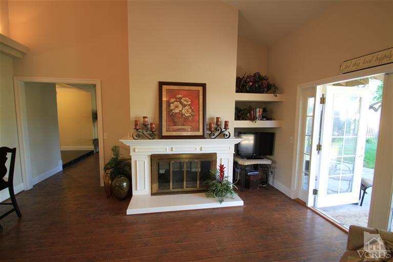 3948 Southhampton Road Moorpark, CA 93021 - Photo 10 of 30 a living room with furniture and a fireplace
