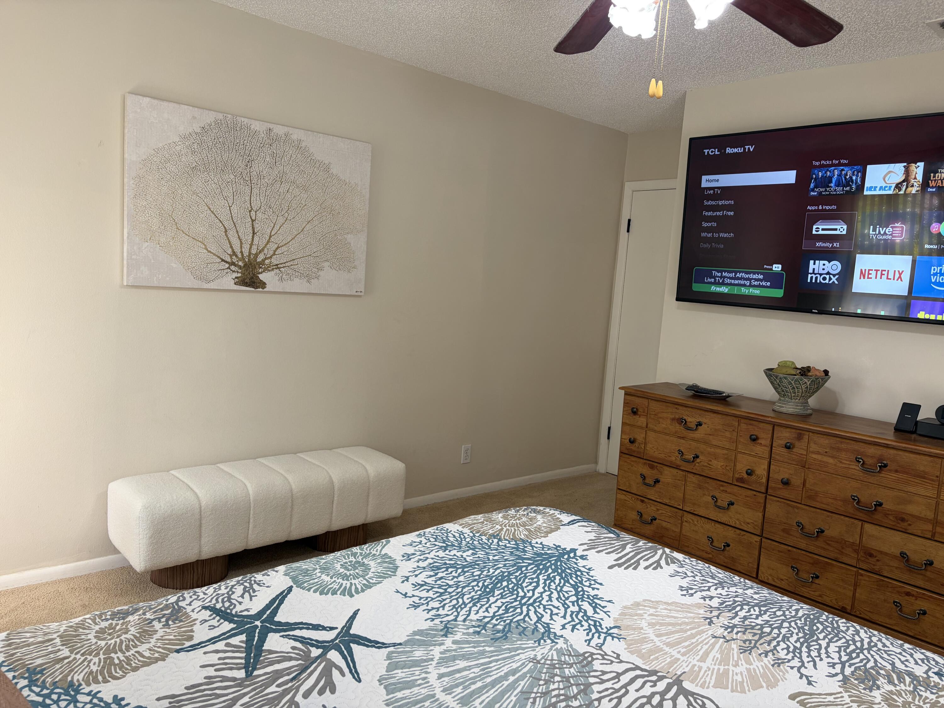 354 Southwest 28th Avenue Delray Beach, FL 33445 - Photo 15 of 54 a bedroom with a bed and a television