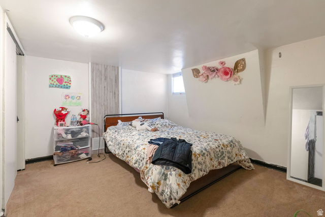 654 North 100 East Logan, UT 84321 - Photo 18 of 41 Bedroom with carpet flooring
