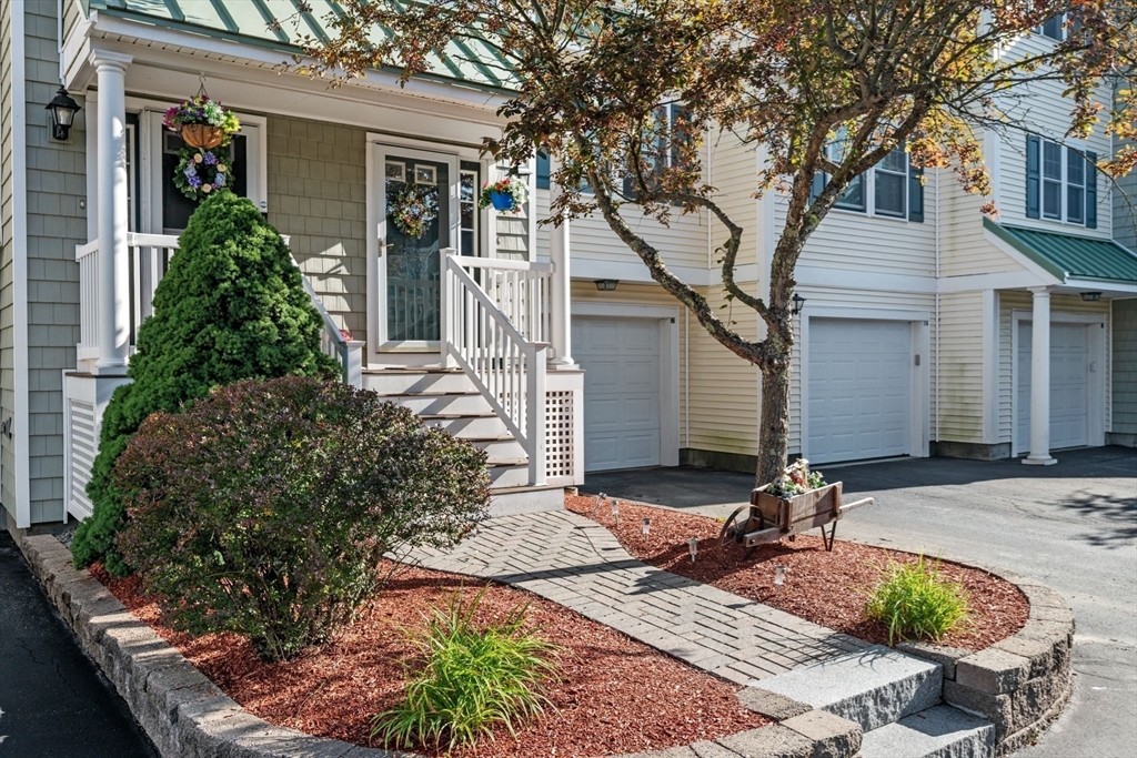 35 Collins Street, Unit 73 Danvers, MA 01923 - Photo 2 of 30 a front view of house with yard
