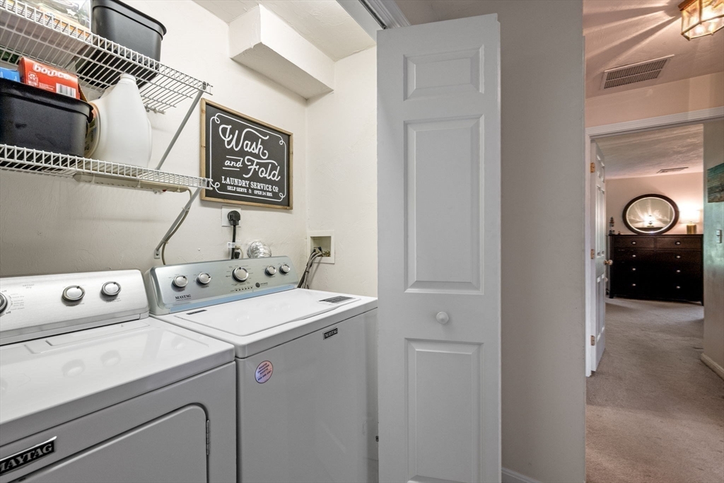 35 Collins Street, Unit 73 Danvers, MA 01923 - Photo 23 of 30 a utility room with dryer and washer