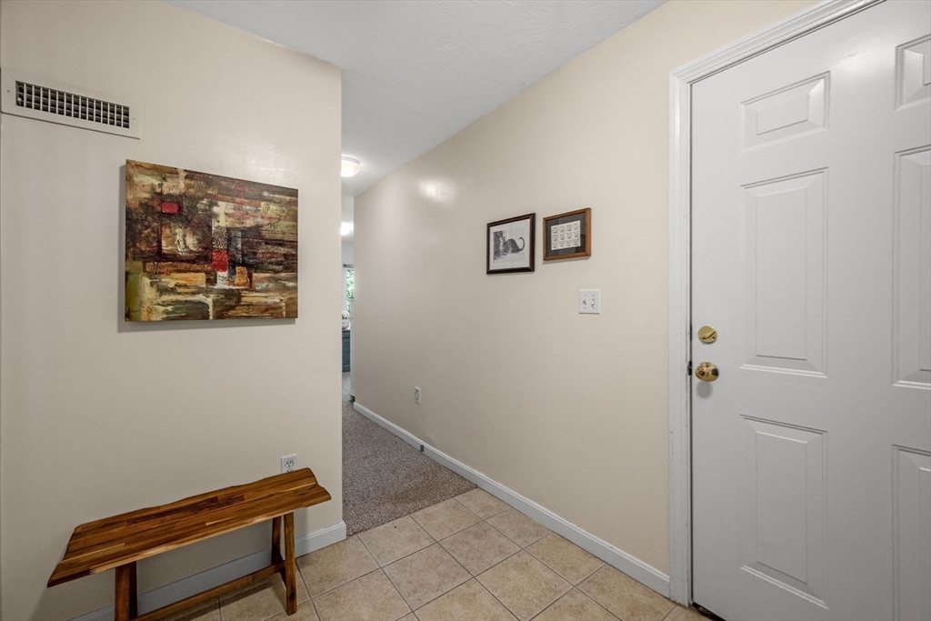 35 Collins Street, Unit 73 Danvers, MA 01923 - Photo 24 of 30 a view of room with painting and a stairs