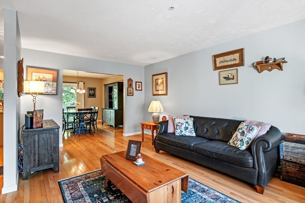 35 Collins Street, Unit 73 Danvers, MA 01923 - Photo 7 of 30 a living room with furniture and wooden floor