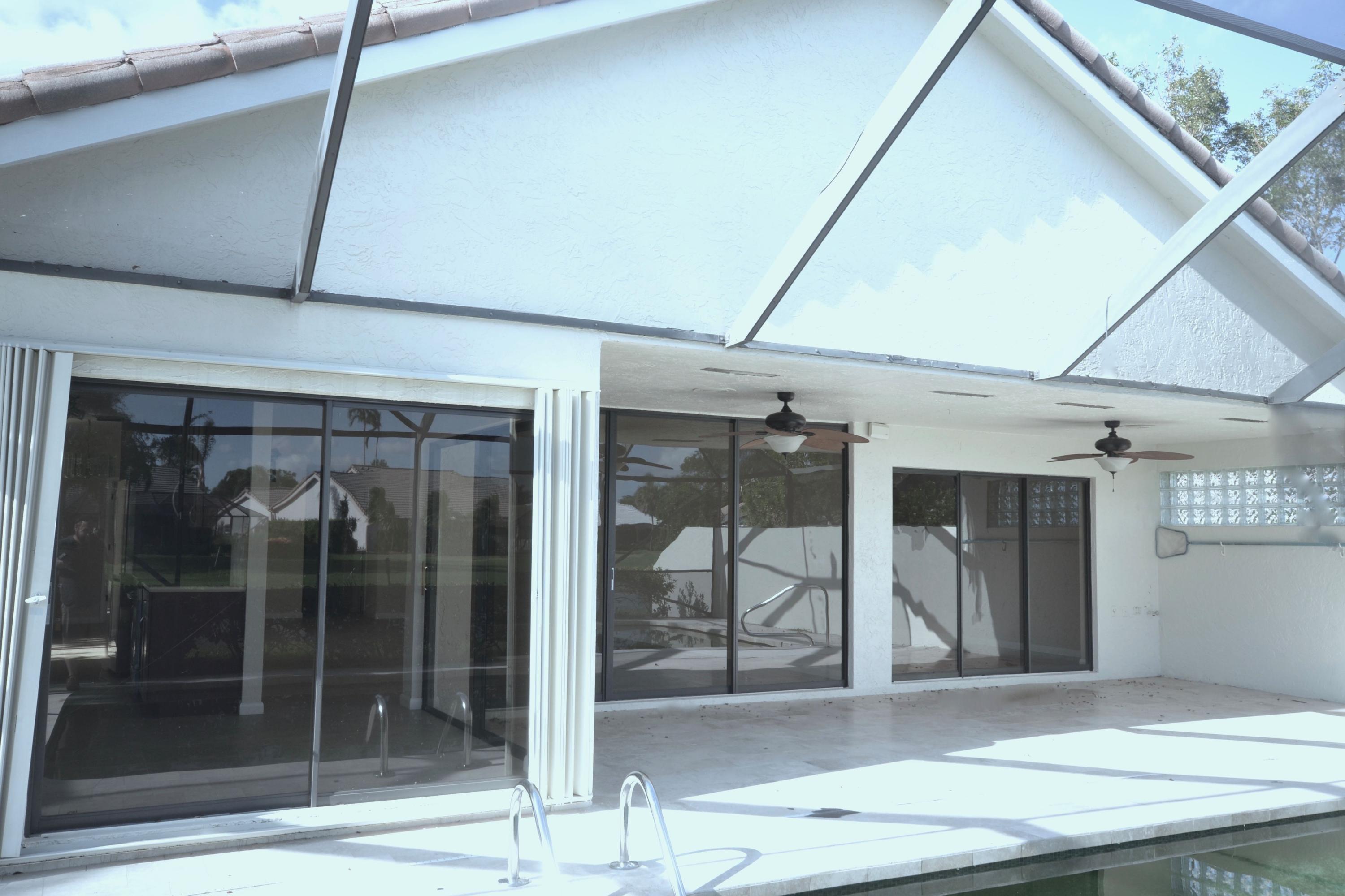 10176 Sunset Bend Drive Boca Raton, FL 33428 - Photo 27 of 41 Covered Stone Patio w/Fans