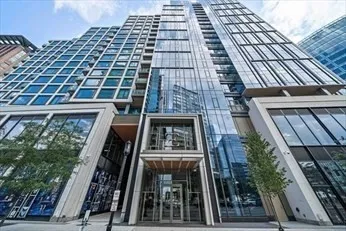 a front view of a house with a garage