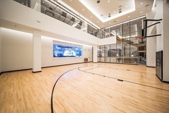 133 Seaport Boulevard, Unit 1017 Boston, MA 02210 - Photo 25 of 28 a view of a room with gym equipment