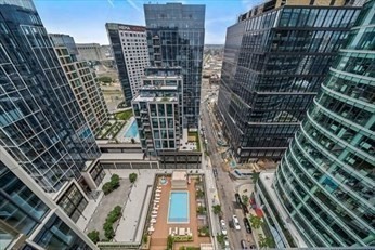 133 Seaport Boulevard, Unit 1017 Boston, MA 02210 - Photo 26 of 28 a city view with tall buildings