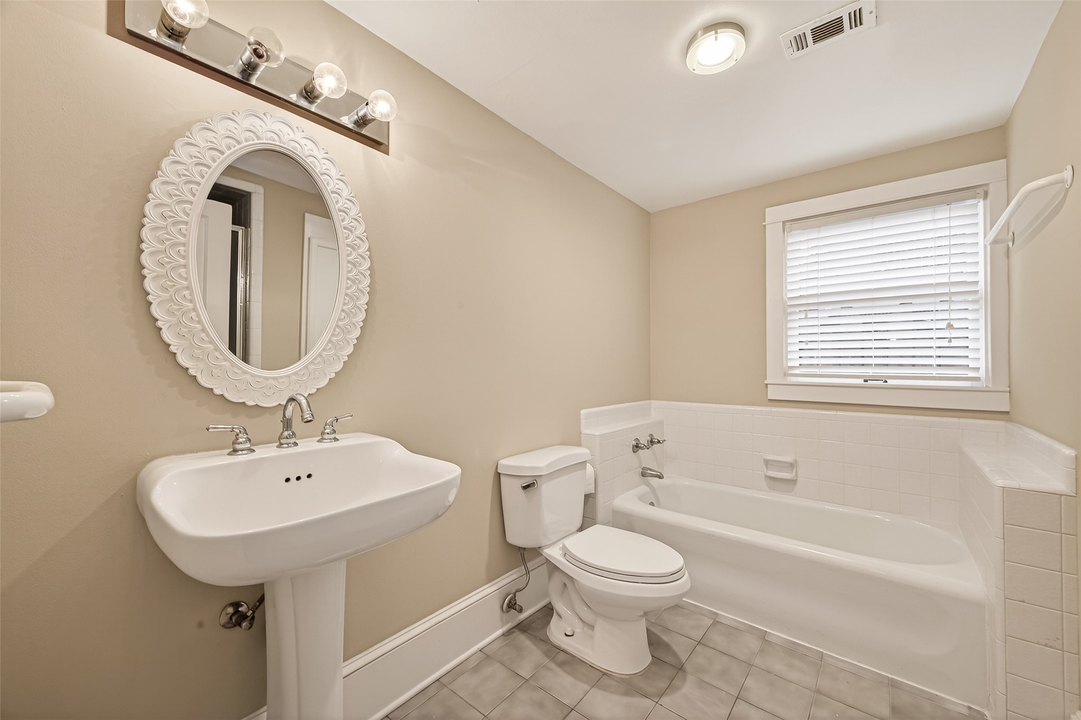 1807 Crocker Street, Unit A Houston, TX 77006 - Photo 25 of 37 a bathroom with a toilet sink and mirror