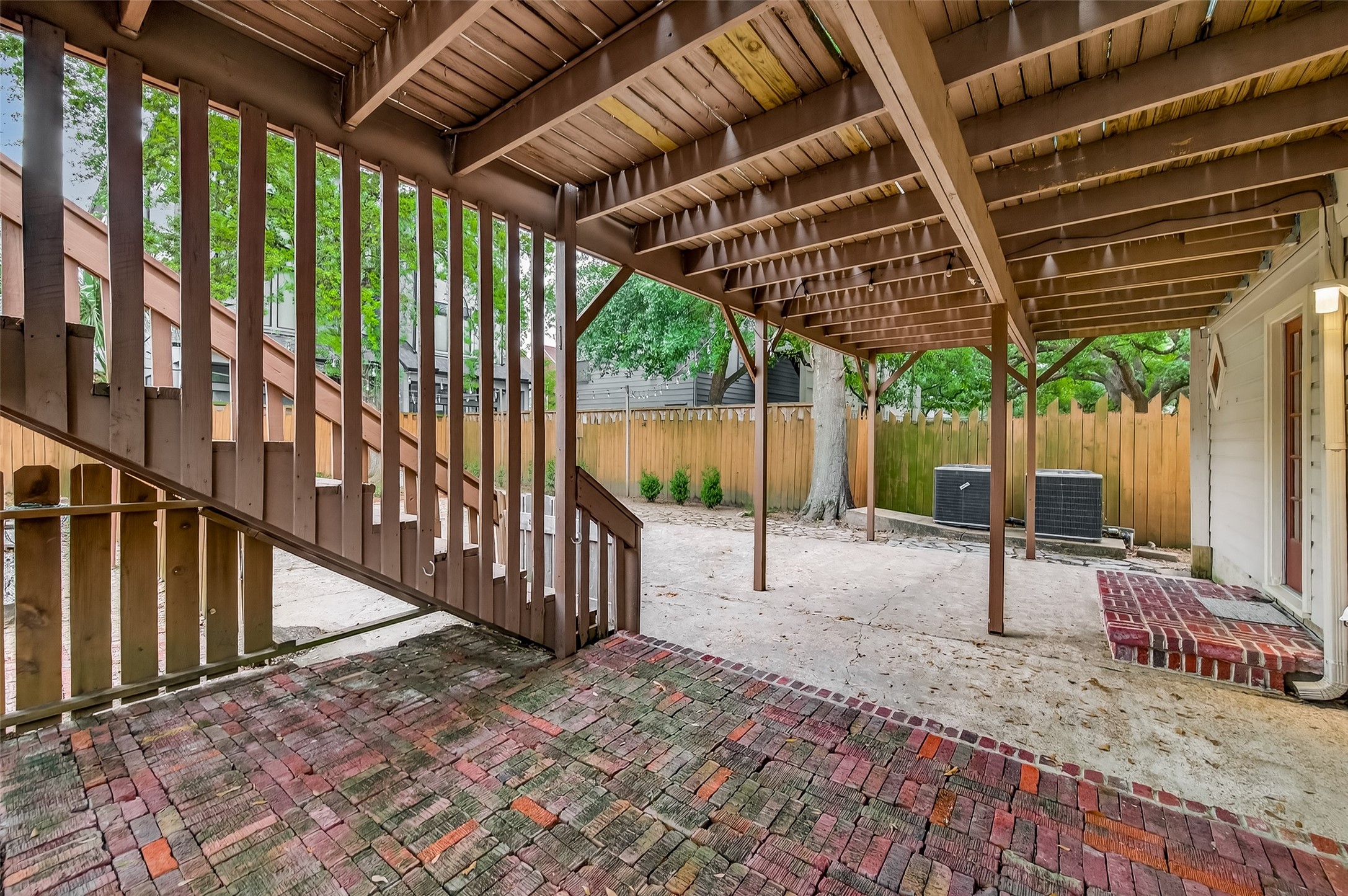 1807 Crocker Street, Unit A Houston, TX 77006 - Photo 30 of 37 Stepping out the back door (where the mudroom is), you can enjoy this covered bricked patio!