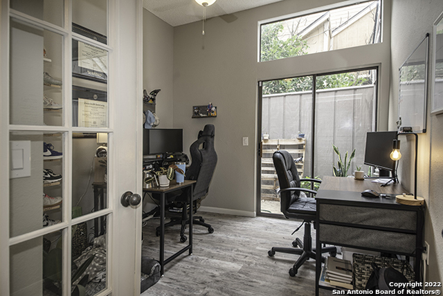 16807 Cedar Tree Way San Antonio, TX 78247 - Photo 17 of 30 a view of a workspace with furniture and a window