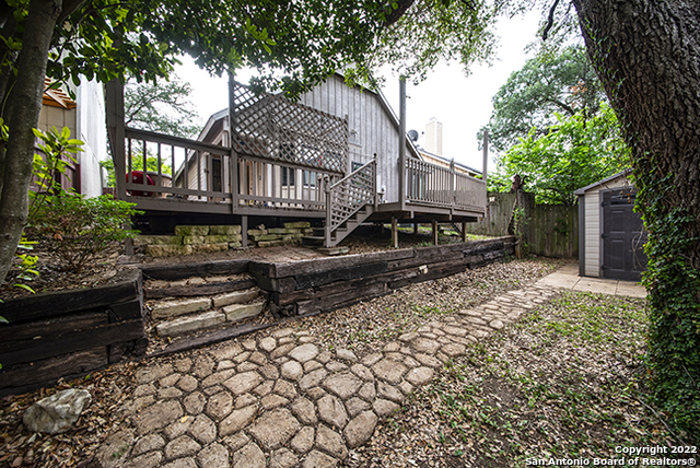 16807 Cedar Tree Way San Antonio, TX 78247 - Photo 27 of 30 a front view of a house with a yard