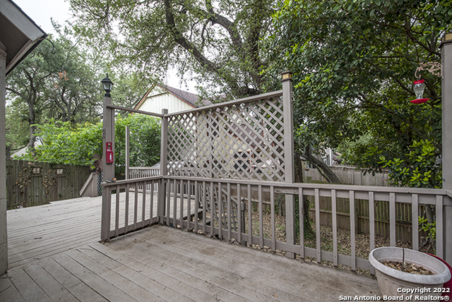 16807 Cedar Tree Way San Antonio, TX 78247 - Photo 29 of 30 a view of a wooden deck and a backyard