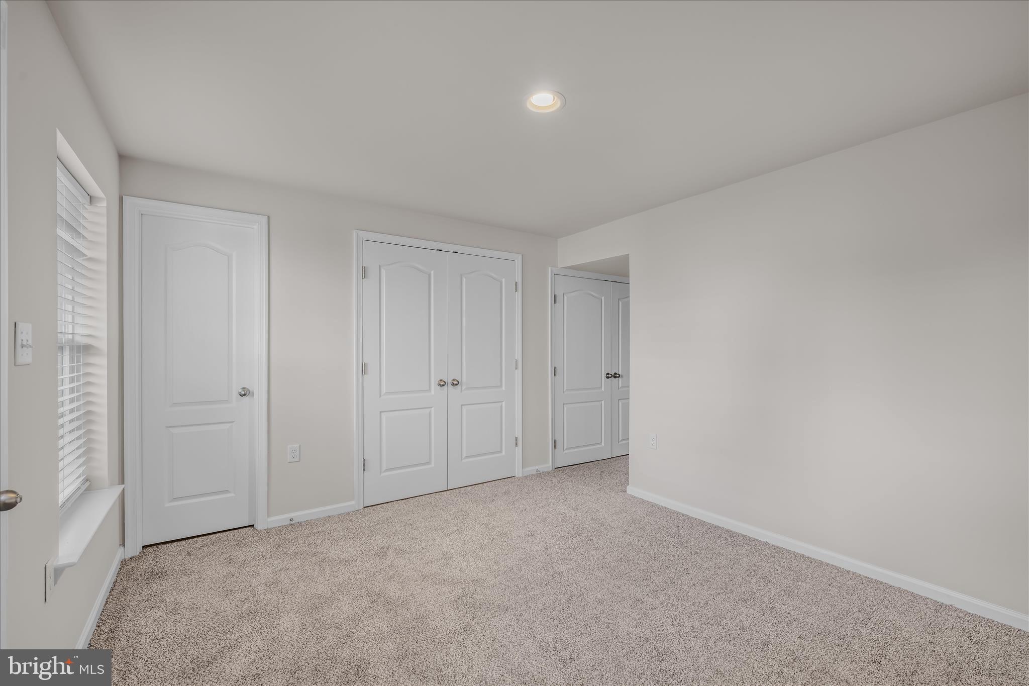 386 Rumbling Rock Road Hedgesville, WV 25427 - Photo 8 of 39 a view of an empty room and closet area